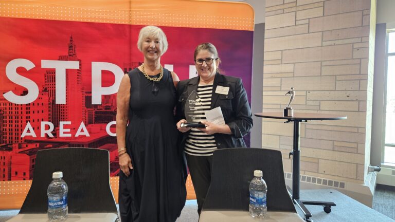 Open Arms Chief External Affairs Officer, Lisa Lane, receives the Celebrate Service Award from the St. Paul Area Chamber on Sept. 11, 2024.